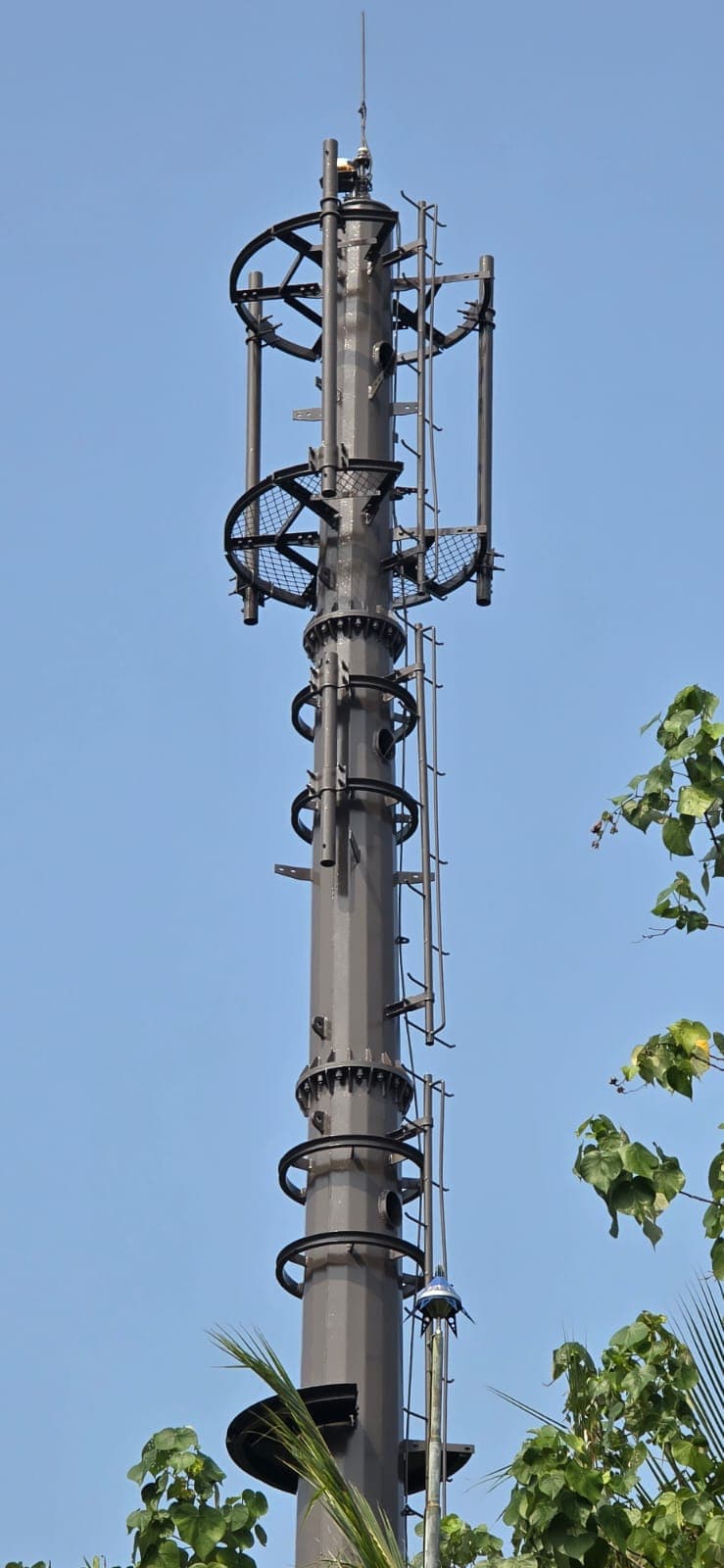 Galvanised monopole telecom tower with climbing rungs