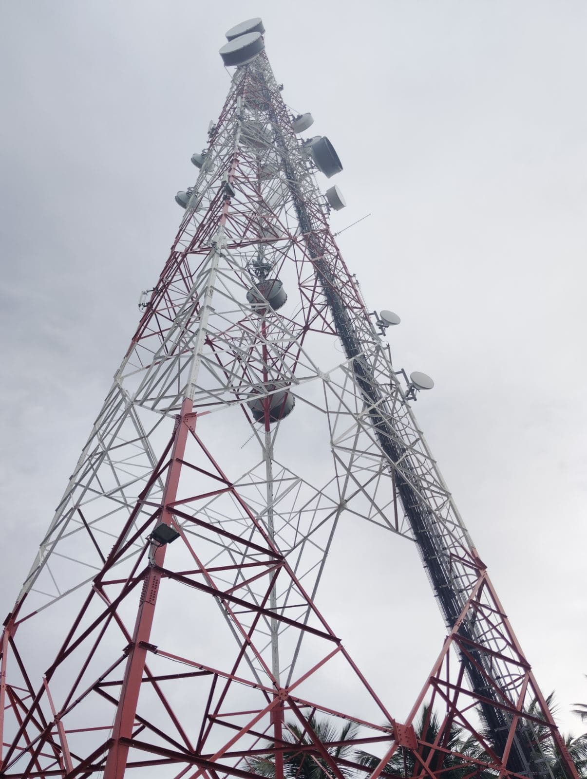 Red-and-white lattice telecom tower