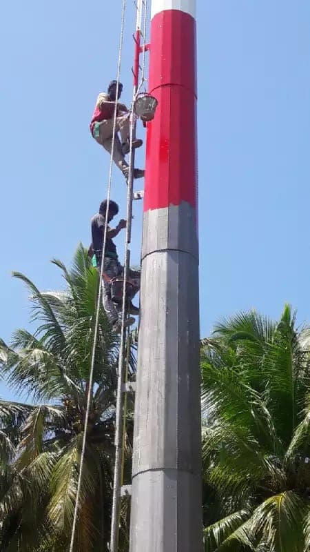 Rishthaa crew painting and rectifying a telecom tower