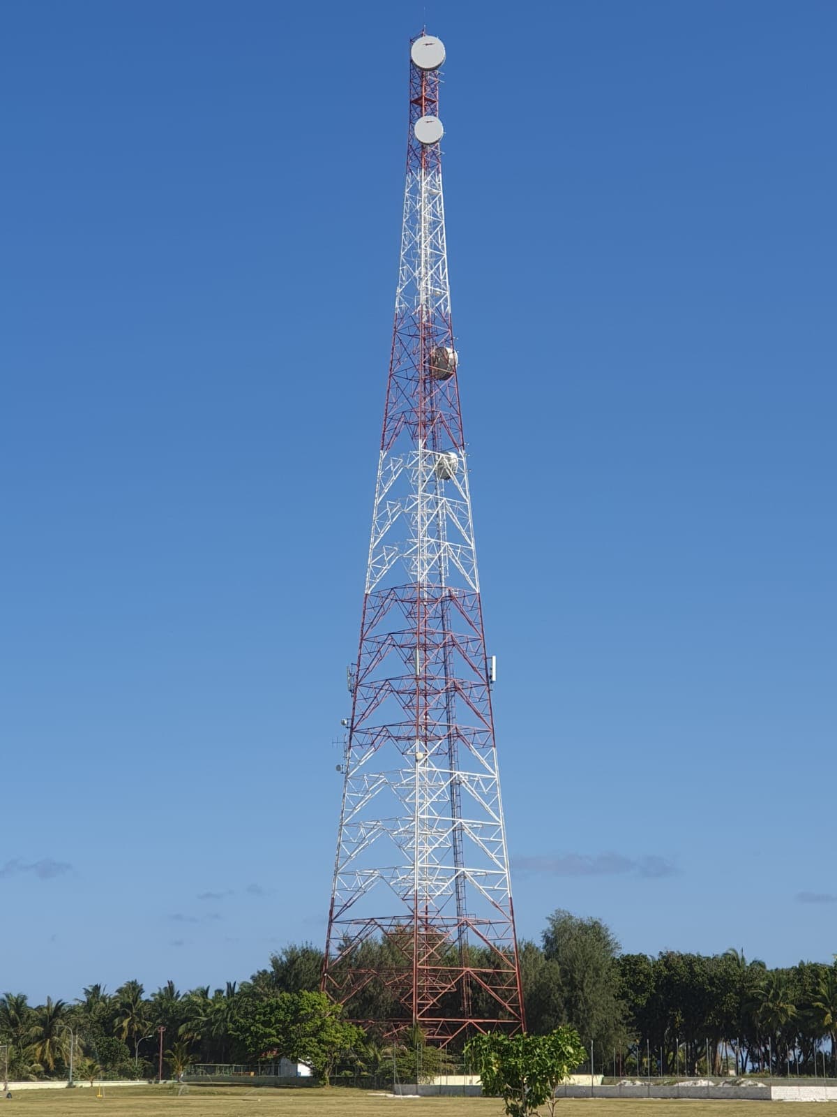 Tall lattice telecom tower on a Maldivian island